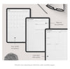 Three monthly planner pages displayed on a surface with text indicating features and uses.